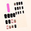 Black manicure Santa Claus