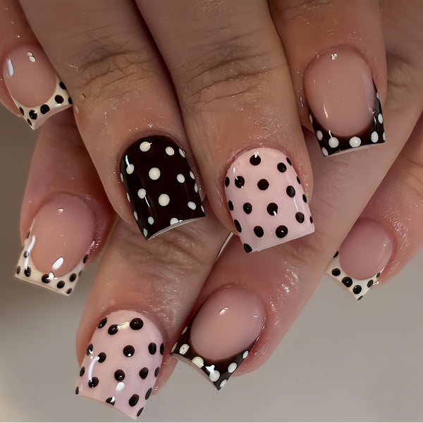 Polka dot white manicure