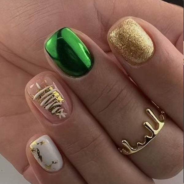 Glitter gold and dark green collide with Christmas tree