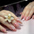 Gilt lace flower pearl