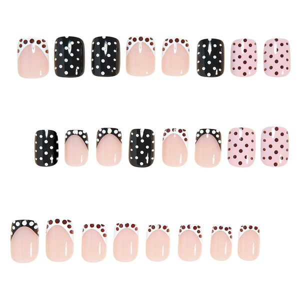 Polka dot white manicure