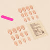 Gold edged nude minimalist nail art
