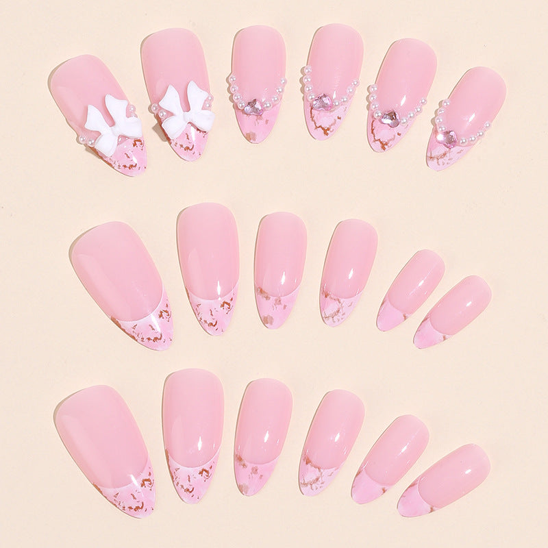 Pearl bow false nails