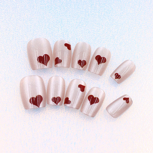 Short cat eye red love nails