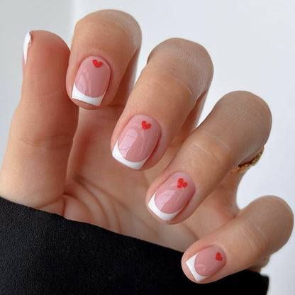 Valentine's Day red heart wearing fake nail