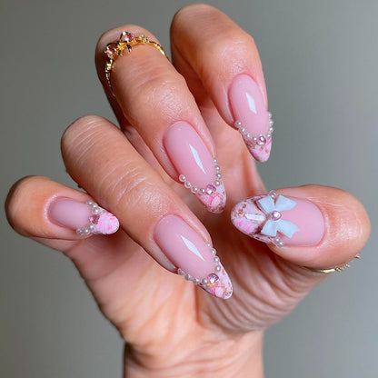 Pearl bow false nails