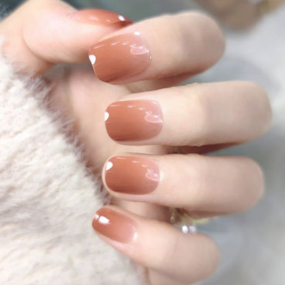 Blush and orange manicure